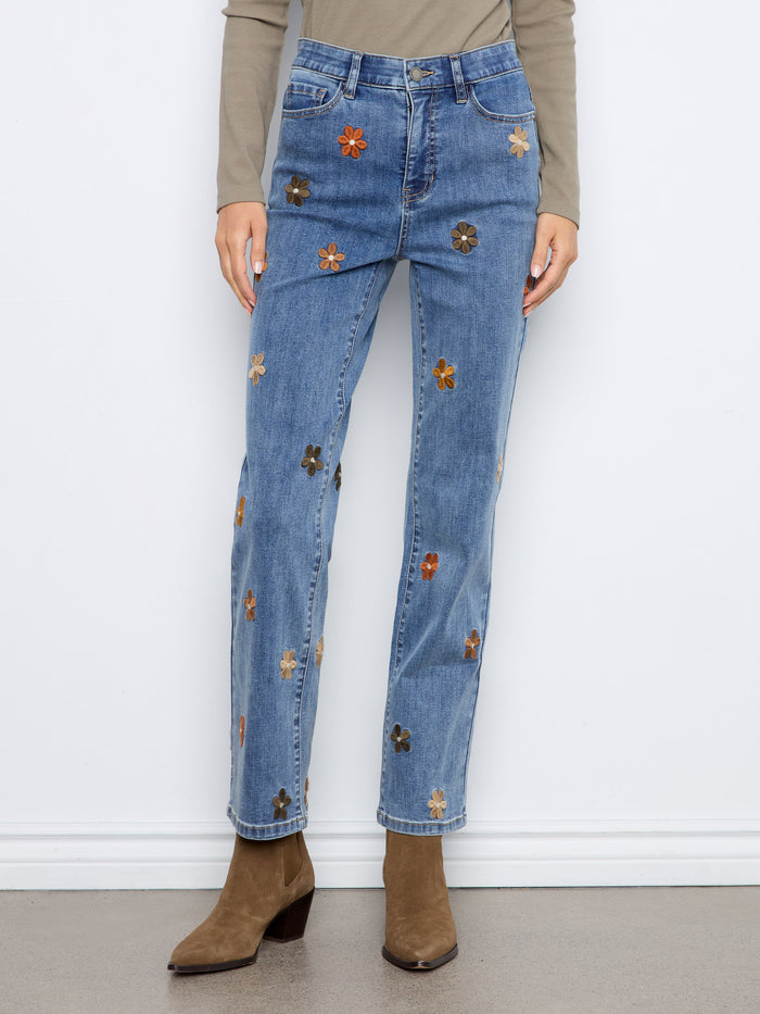 These jeans offer an elastic waistband, ensuring a snug fit while maintaining style and elegance. Ideal for any wardrobe. By Charlie B.