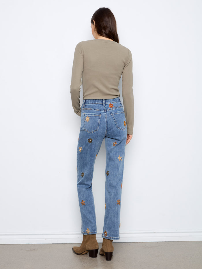 Crafted from stretch denim, these jeans provide flexibility and comfort without compromising on style or durability. By Charlie B.