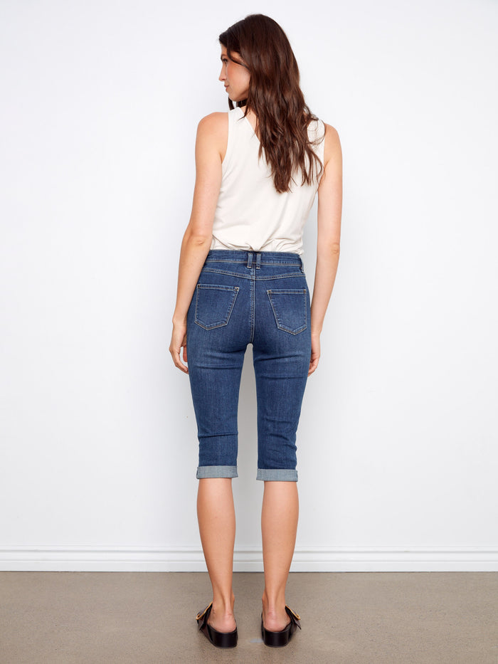 Light blue capri-length pedal pushers in stretch denim, offering comfort and style by Charlie B.