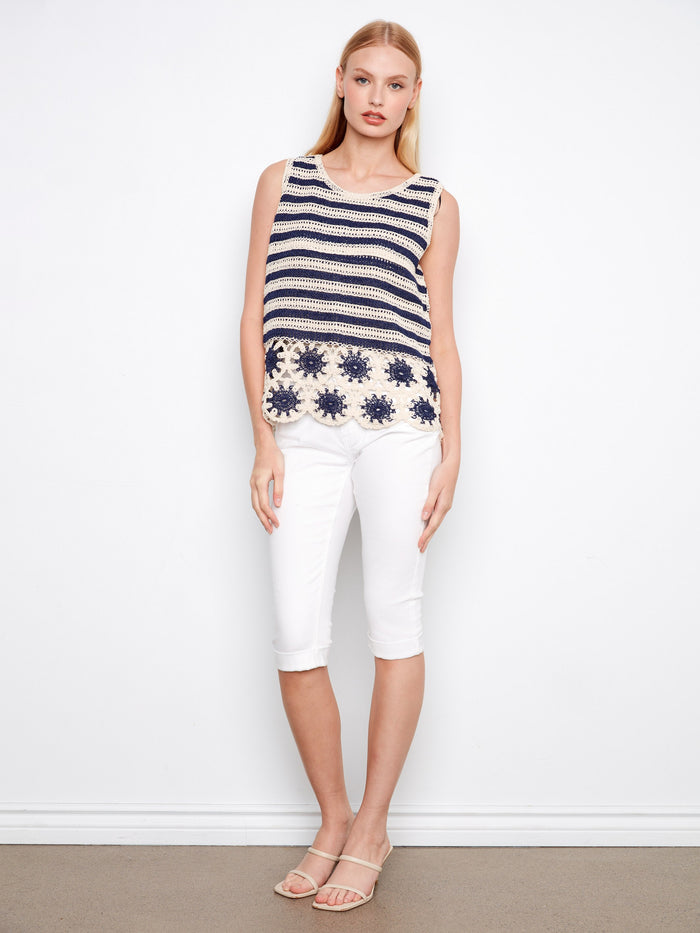 Elegant sleeveless navy and cream striped crochet top with exquisite floral scalloped hem by Charlie B.