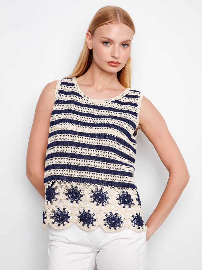 Charming navy striped crochet top with distinctive floral detailing at the hemline, perfect for summer vibes by Charlie B.