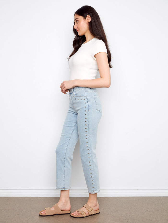 The stud details on these jeans add a touch of edgy sophistication to any outfit. Make a statement effortlessly by Charlie B.