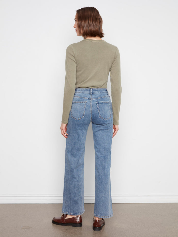 Experience comfort in stretch denim material, ensuring ease of movement while maintaining fashionable appeal by Charlie B.