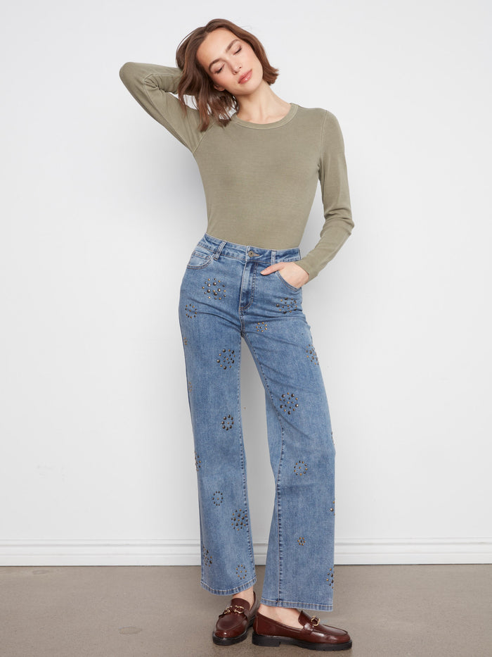 Full-length jeans with regular rise provide a classic silhouette suitable for any occasion or season by Charlie B.
