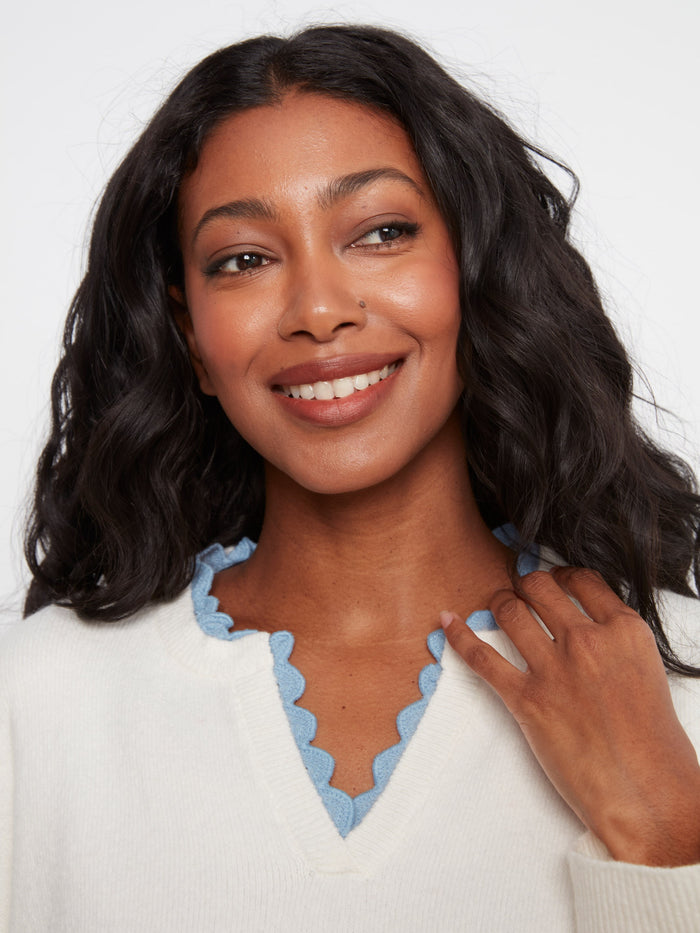 The long sleeves on this sweater provide warmth and style, making it ideal for cooler days by Charlie B.