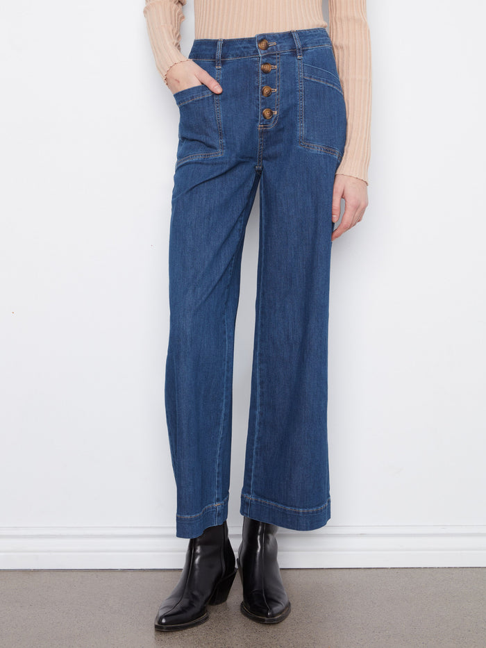 Button closure adds a trendy touch to these wide leg jeans made from soft stretch denim fabric. By Charlie B.