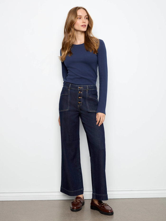 Crafted in stretch denim, these regular rise jeans feature wide legs and practical patch pockets for added style by Charlie B.