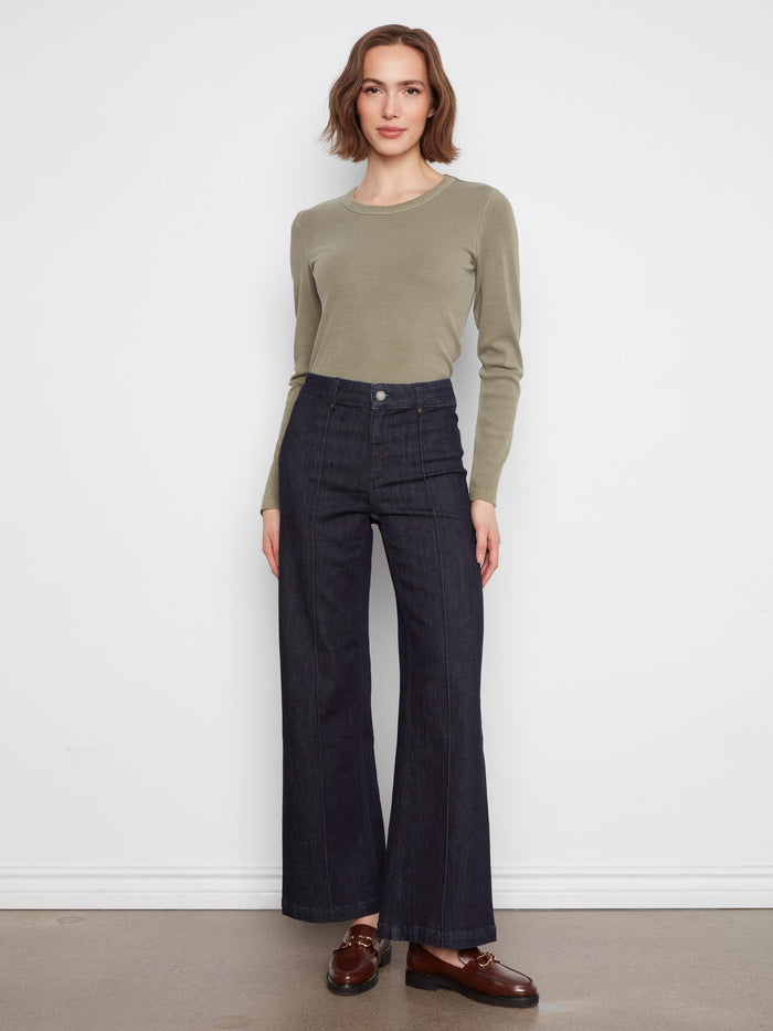 These jeans feature an extra-wide leg design, perfect for a bold statement. Crafted from stretch denim for comfort by Charlie B.