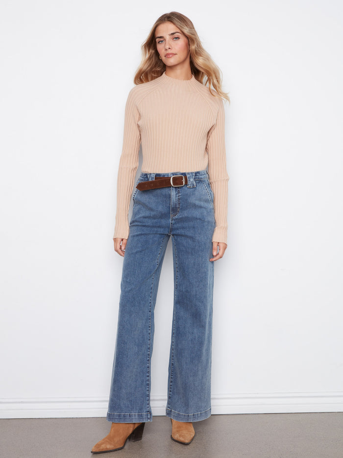Featuring a regular rise, these jeans offer a classic fit that pairs well with various tops and footwear by Charlie B.