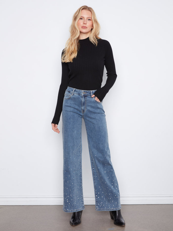 These jeans feature a wide leg design, offering a relaxed and stylish fit, perfect for any casual outing. By Charlie B.