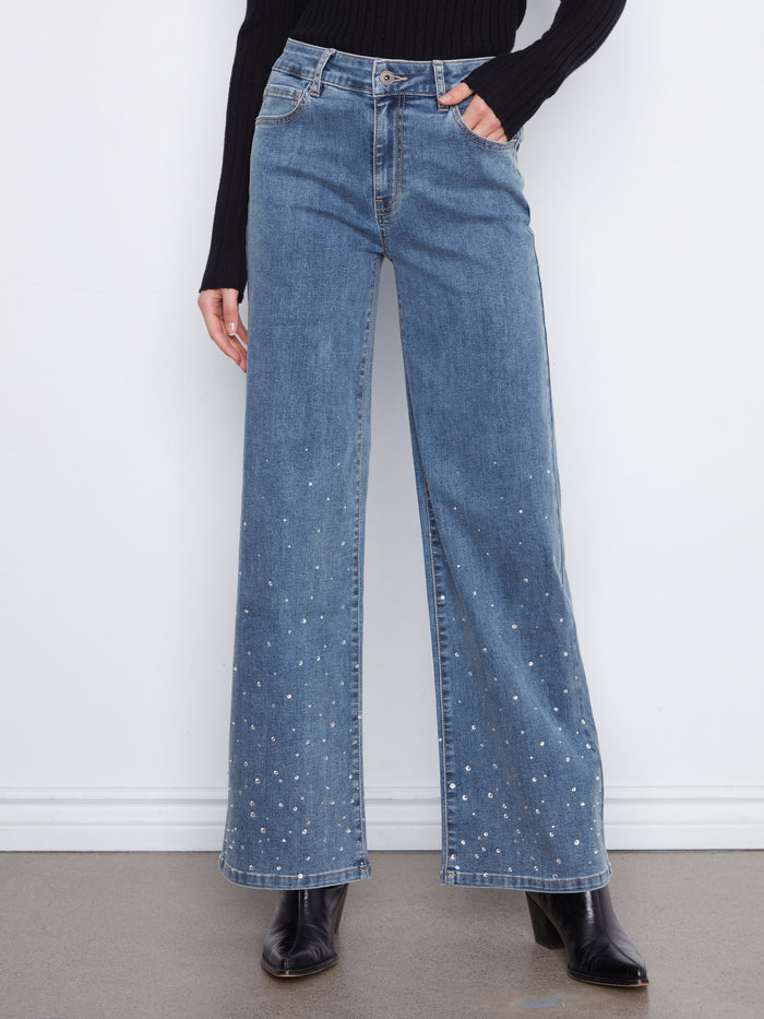 Adorned with rhinestone embellishments on the hem, these jeans add a touch of sparkle to your wardrobe. By Charlie B.
