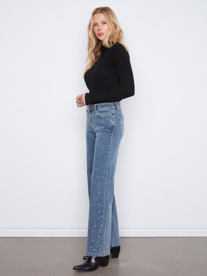 Equipped with five pockets, these jeans offer both style and practicality for everyday wear. By Charlie B.